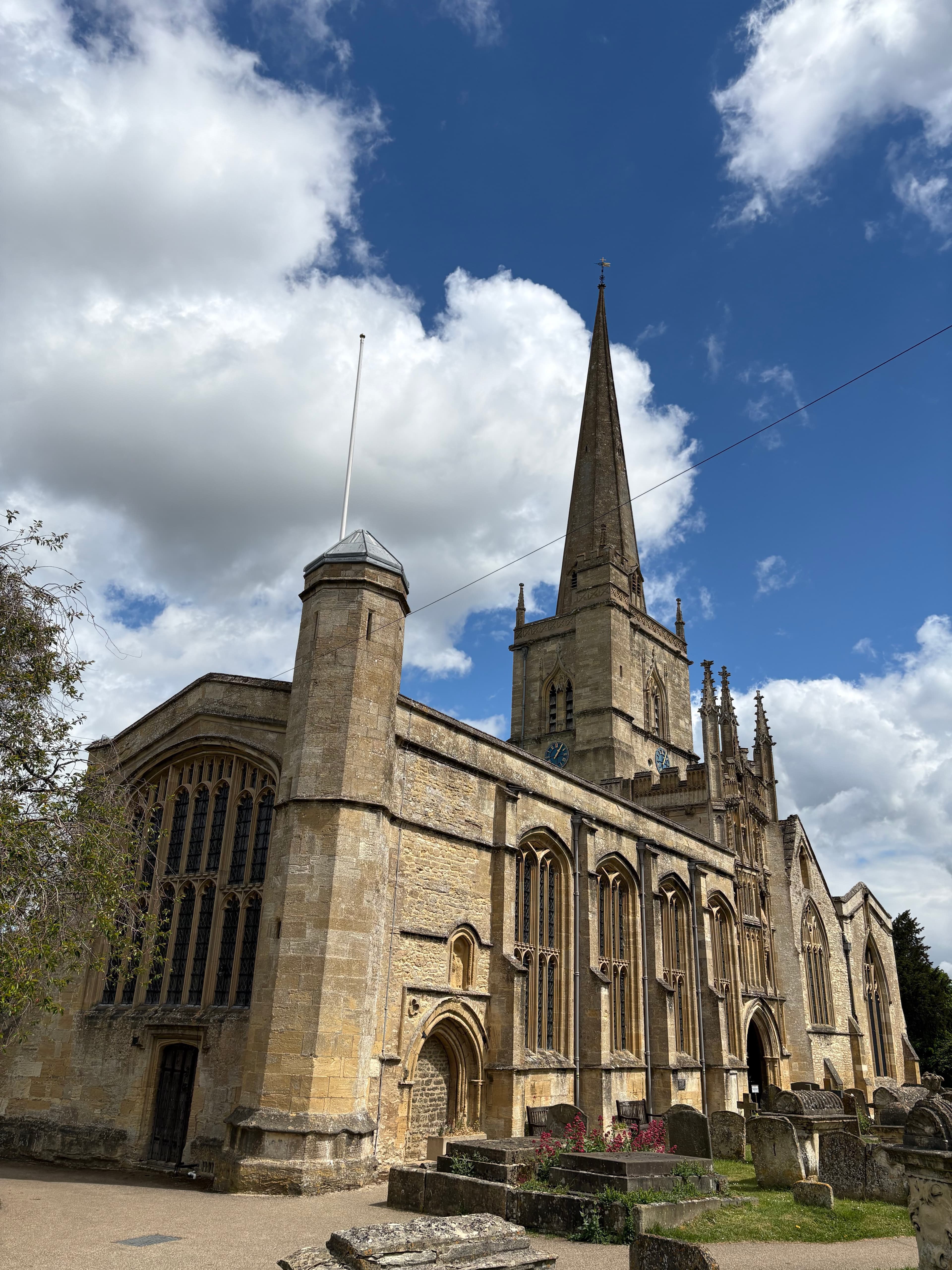 St John the Baptist Church — its spire dominates the lower end of the high street