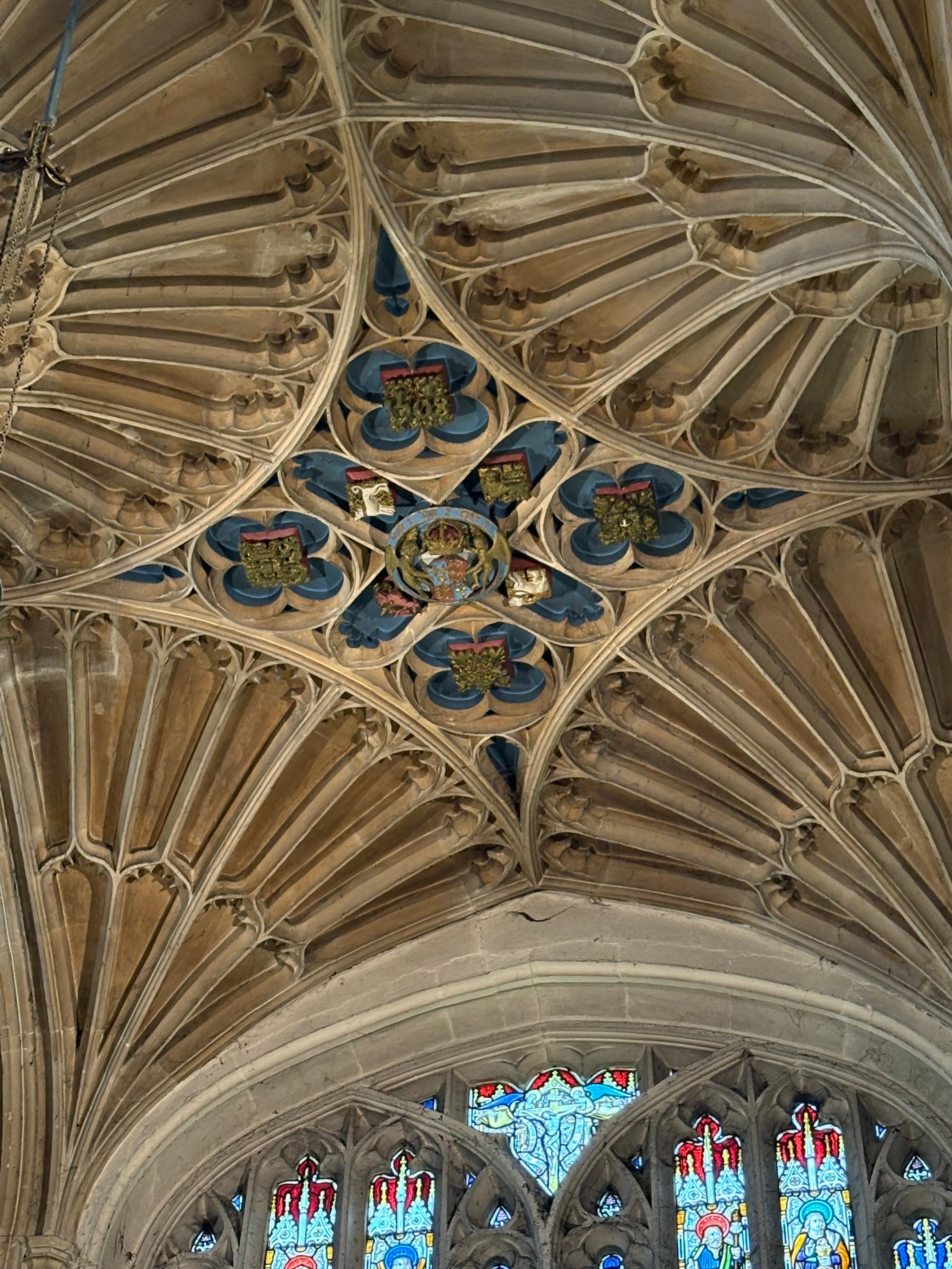 Close-up of the church's elaborate fan-vault ceiling, with painted bosses