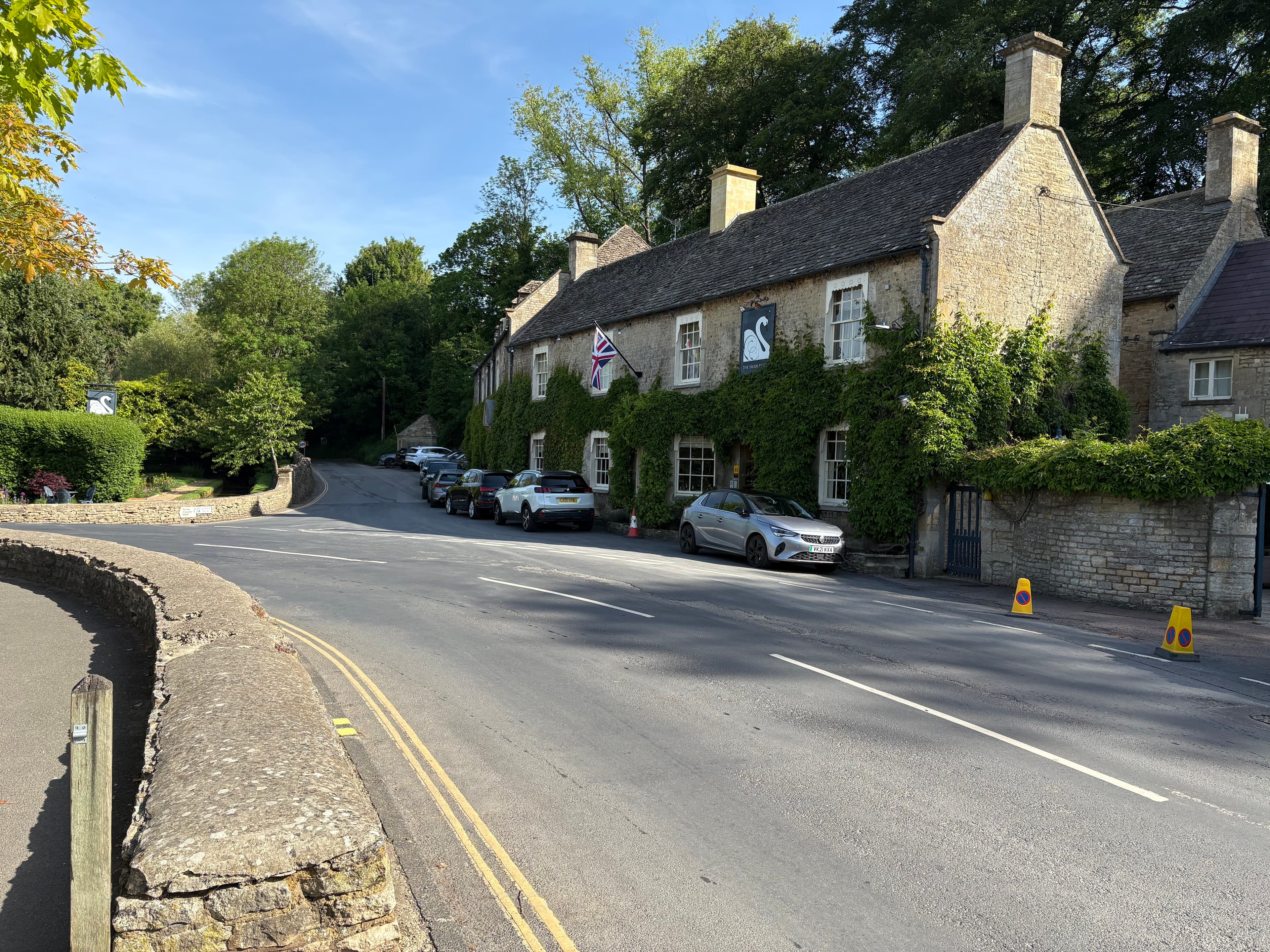 The Swan Hotel and adjoining cottages along the main road through Bibury
