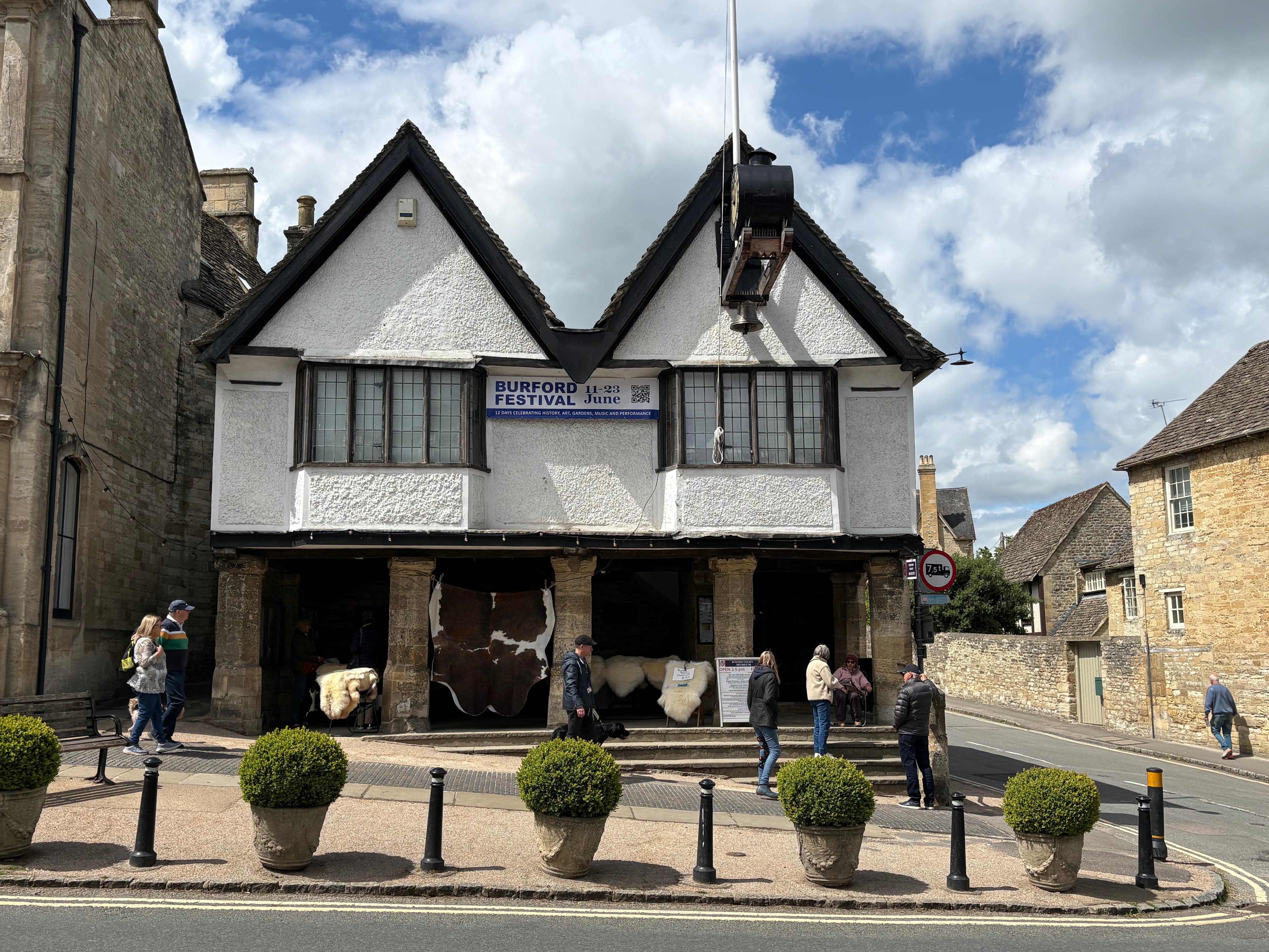The 14th-century Tolsey on the corner of Sheep Street, dressed for the Burford Festival in June