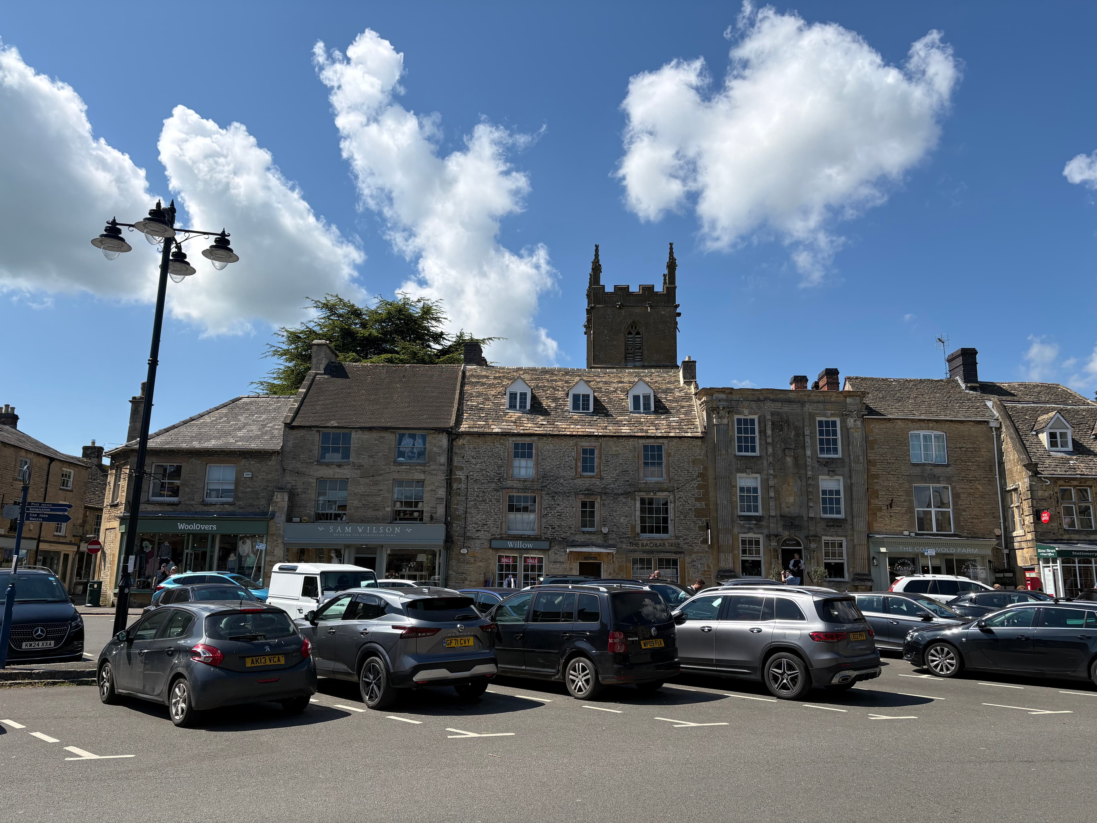 St Edward's Church tower rising over the Market Square at Stow-on-the-Wold